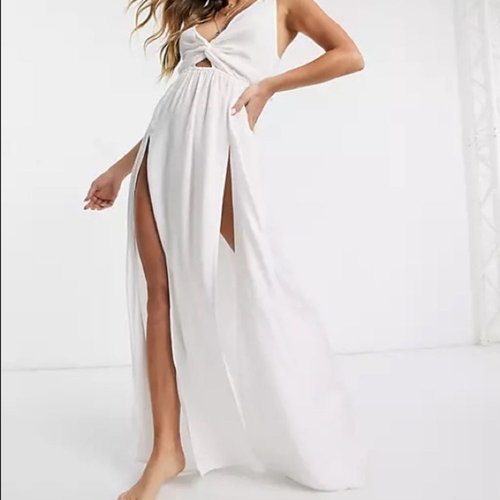 ASOS DESIGN tie back beach maxi dress with twist front detail in white.